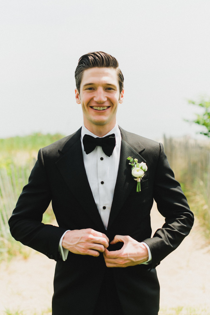 groom white boutonniere